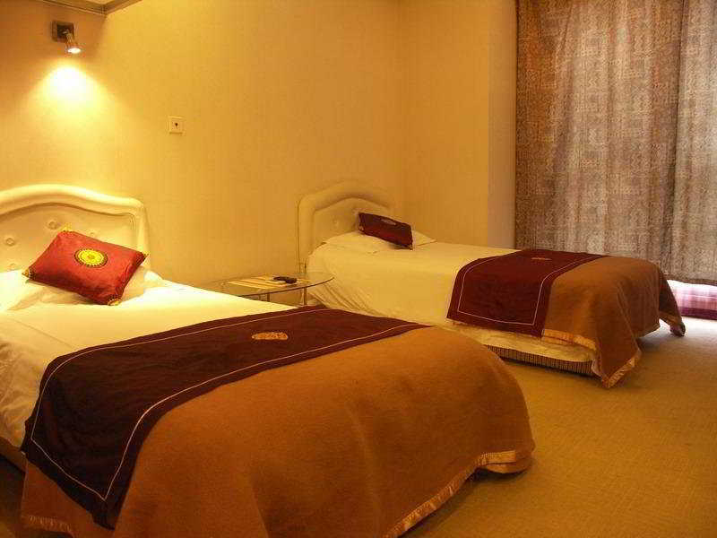 Tong Ji Garden Apartment Шанхай Номер фото